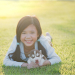 little girl with a dog